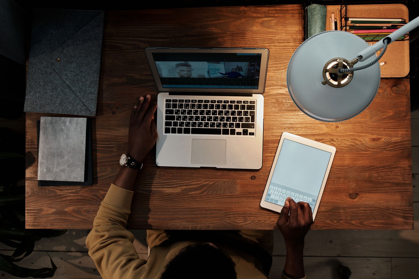 A systems engineer on a video call with teammates